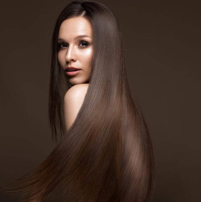 girl with long brown hair Keratin treatment salon Toujours Belle